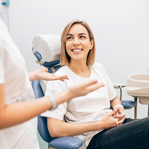 patient talking to dentist