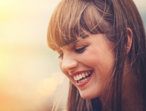 How can a cosmetic dentist in Midlothian improve my smile? 